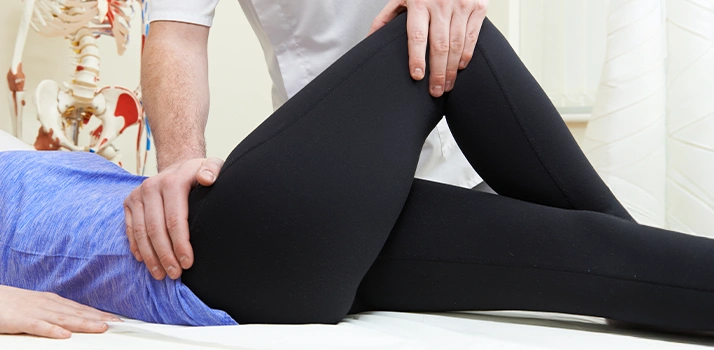 Person Mobilizing Patients Legs