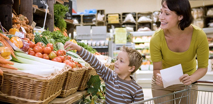 Woman Shopping With Her Child