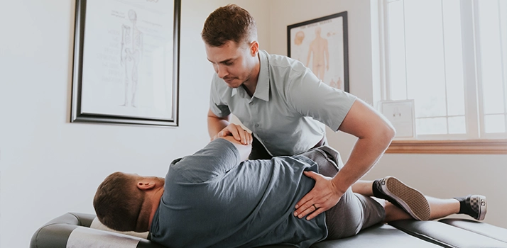 Cory Madison Adjusting A Patients Back