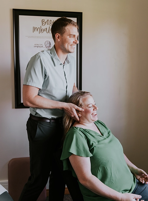 Cory Madison Examining Happy Patient
